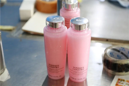 化妆品制假售假钟爱兰蔻粉水，兰蔻粉水真假辨别图  2020 假货 粉水 第8张