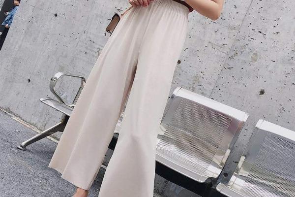 阔腿裤会不会显腿短，阔腿裤可以配马丁靴吗